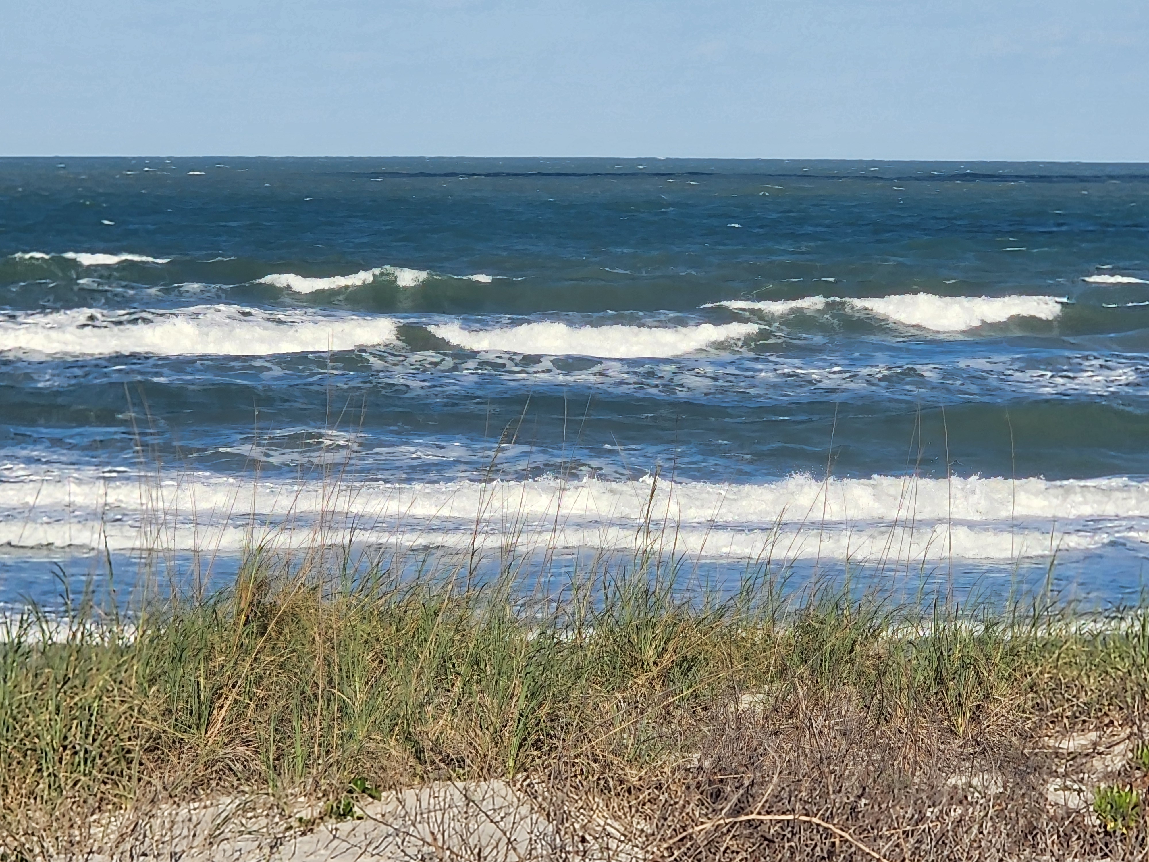 Cocoa Beach surf photo 3 — Afternoon update — 1-2' with SSE winds. Bumpy but rideable.