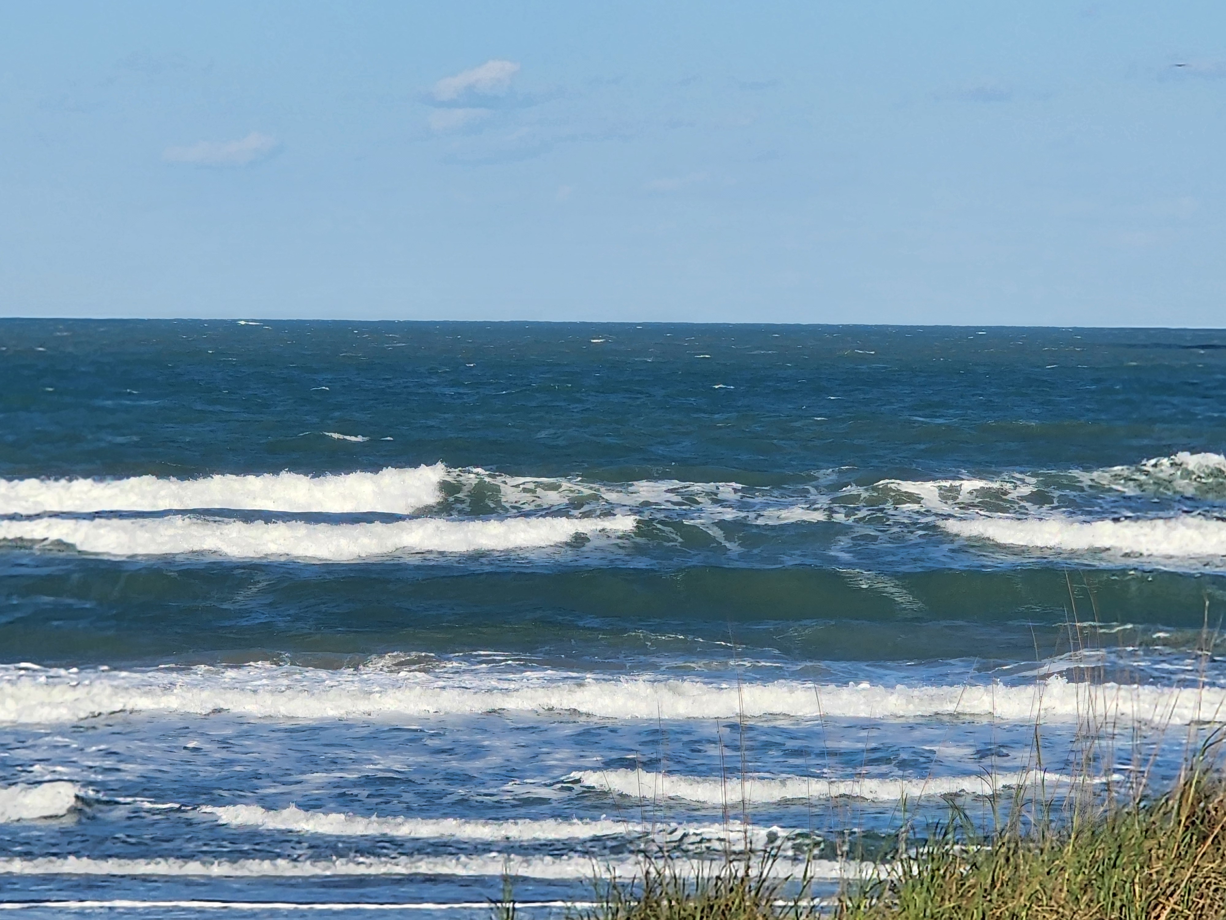 Cocoa Beach surf photo 5 — Afternoon update — 1-2' with SSE winds. Bumpy but rideable.