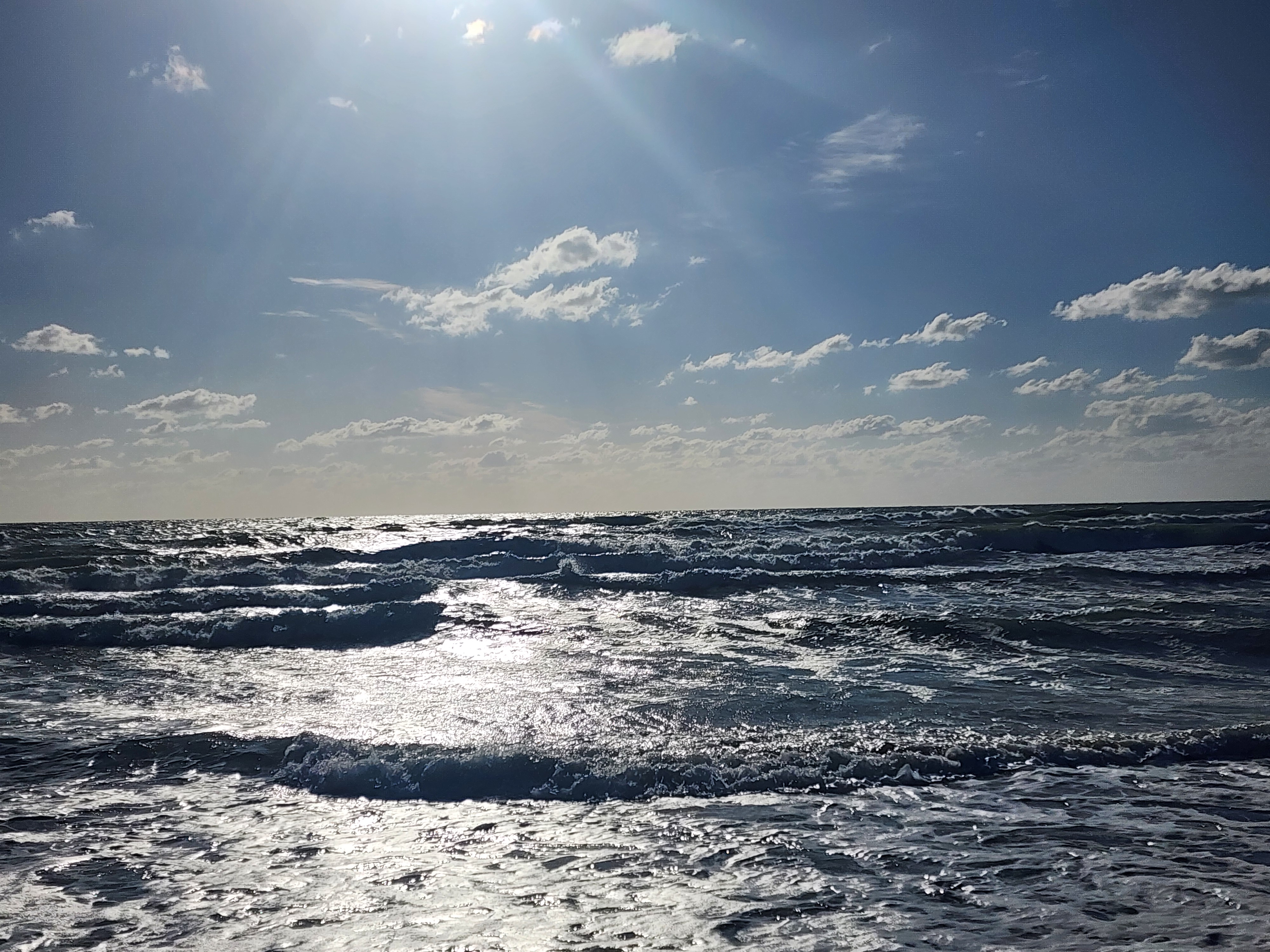 Cocoa Beach surf photo 4 — 1-2' with light winds — fun morning longboard session.