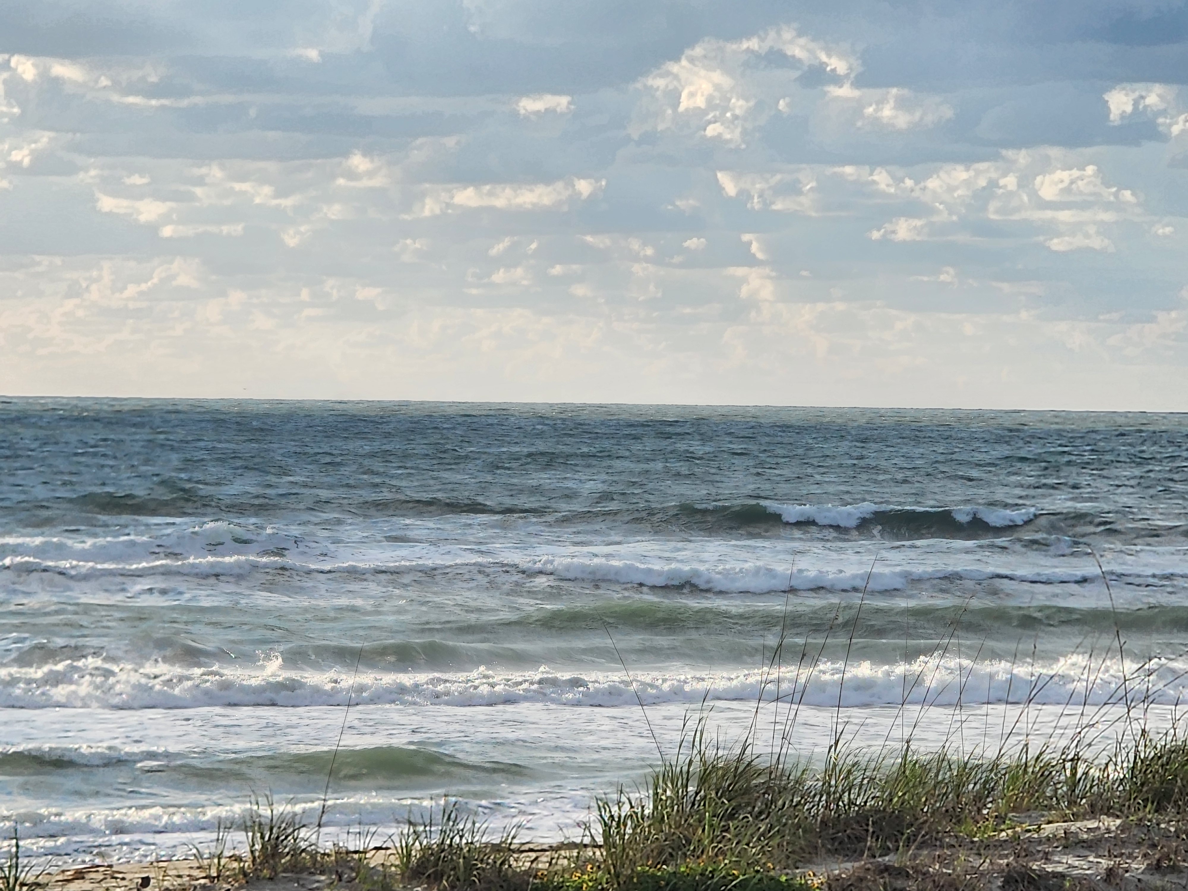 Cocoa Beach surf photo 3 — 1-2' with light ESE texture — rideable but bumpy.