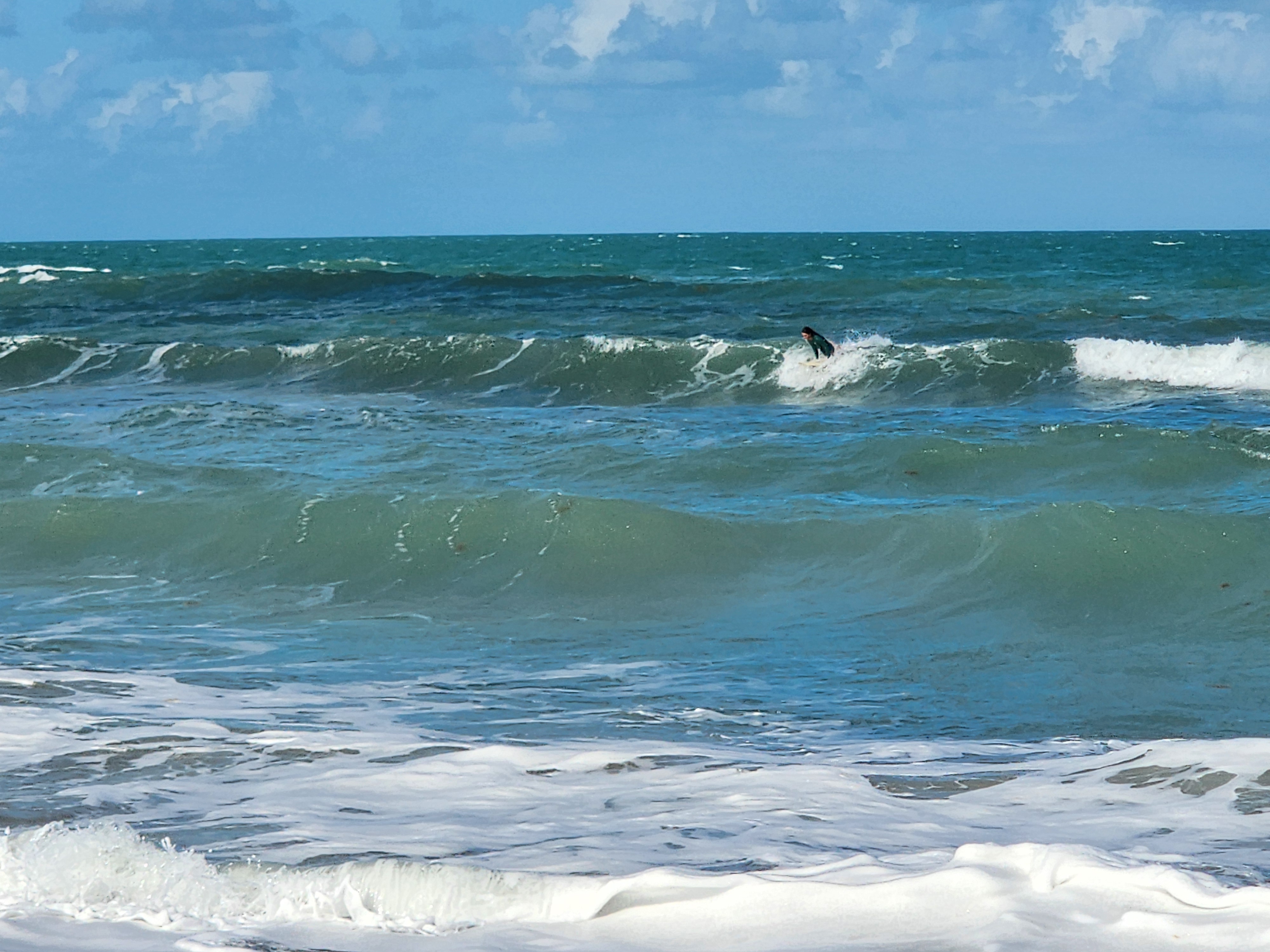 Clean 1-2 foot wave at Picnic Tables South Cocoa Beach afternoon glass-off WSW winds
