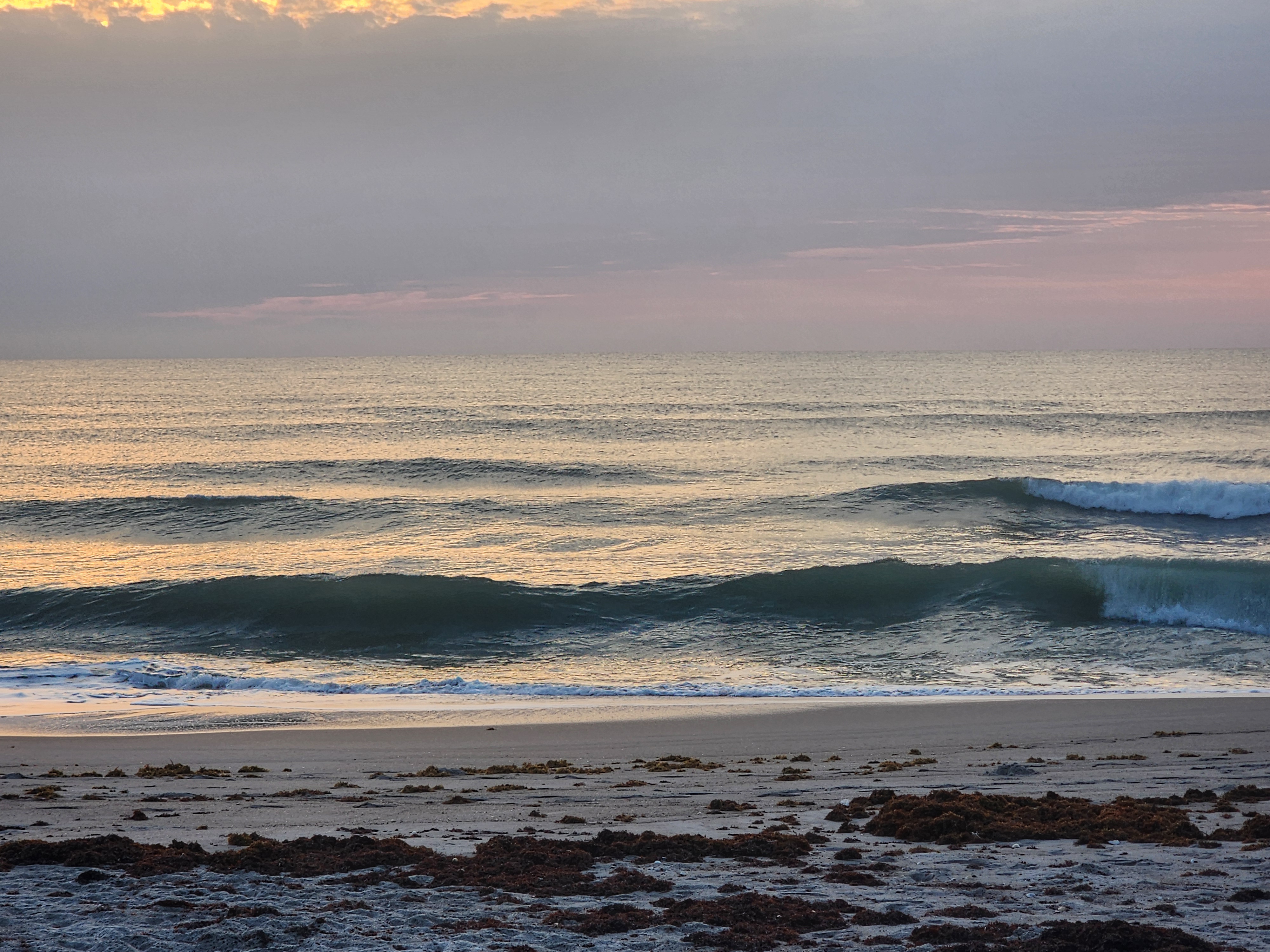 Perfect glassy 2 foot wave with green face at Picnic Tables South Cocoa Beach SW offshore winds