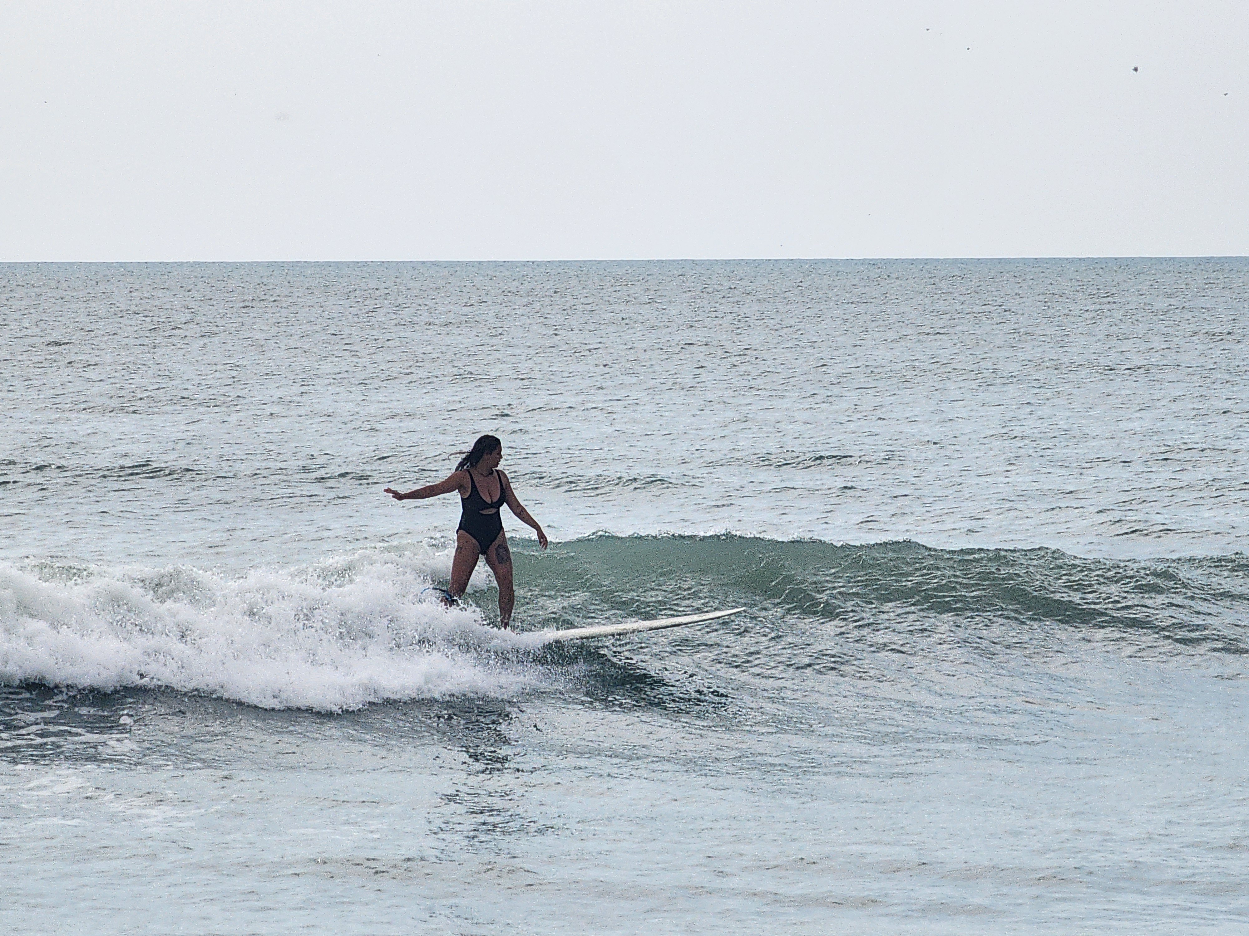Cocoa Beach surf photo 11 — 2'+ longboard waves breaking to beach — super fun morning! Bean Reefers were shredding.