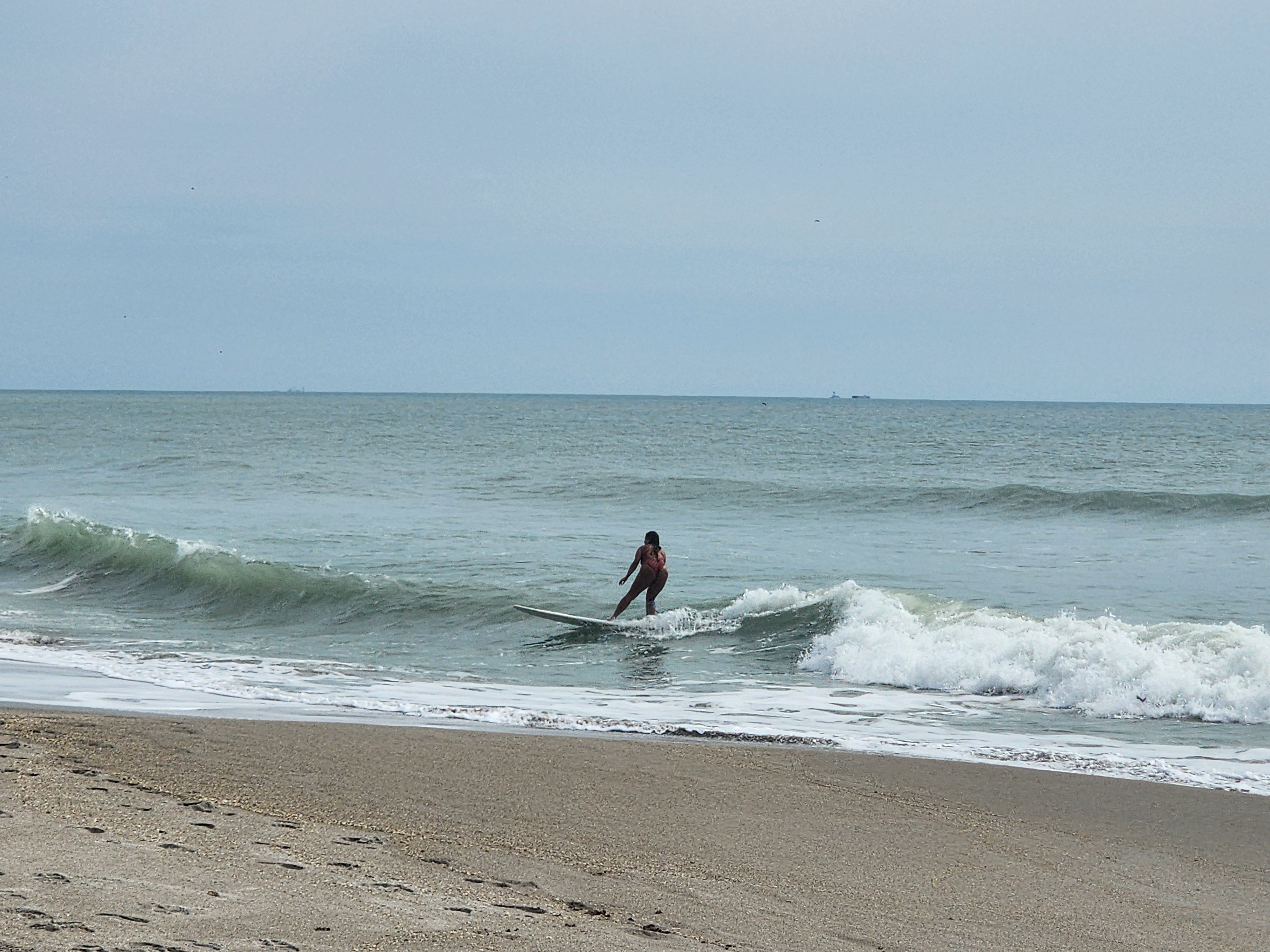 Cocoa Beach surf photo 6 — 2'+ longboard waves breaking to beach — super fun morning! Bean Reefers were shredding.