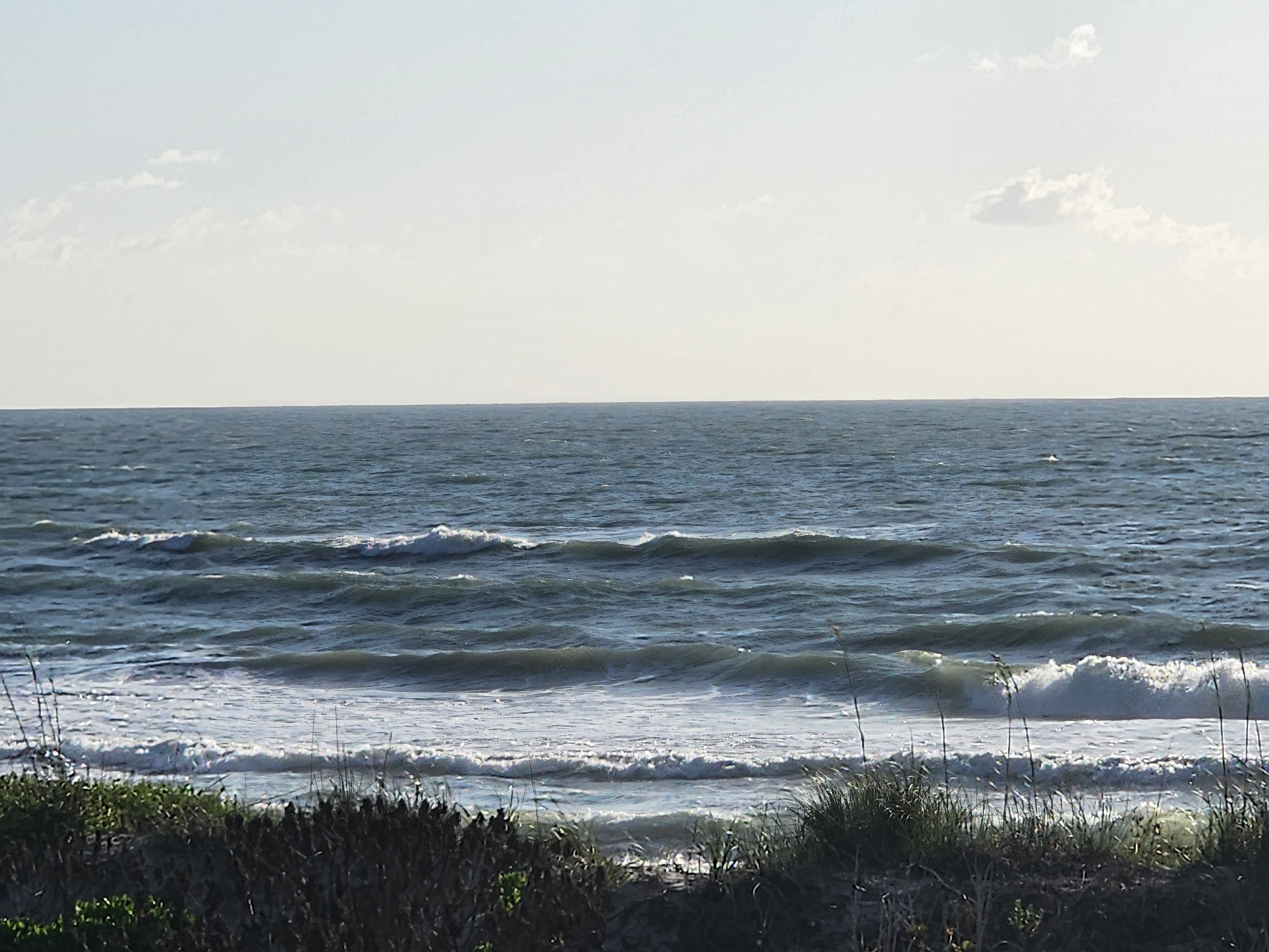 Bumpy choppy 2-3 foot surf breaking at Picnic Tables South Cocoa Beach morning May 5 2026