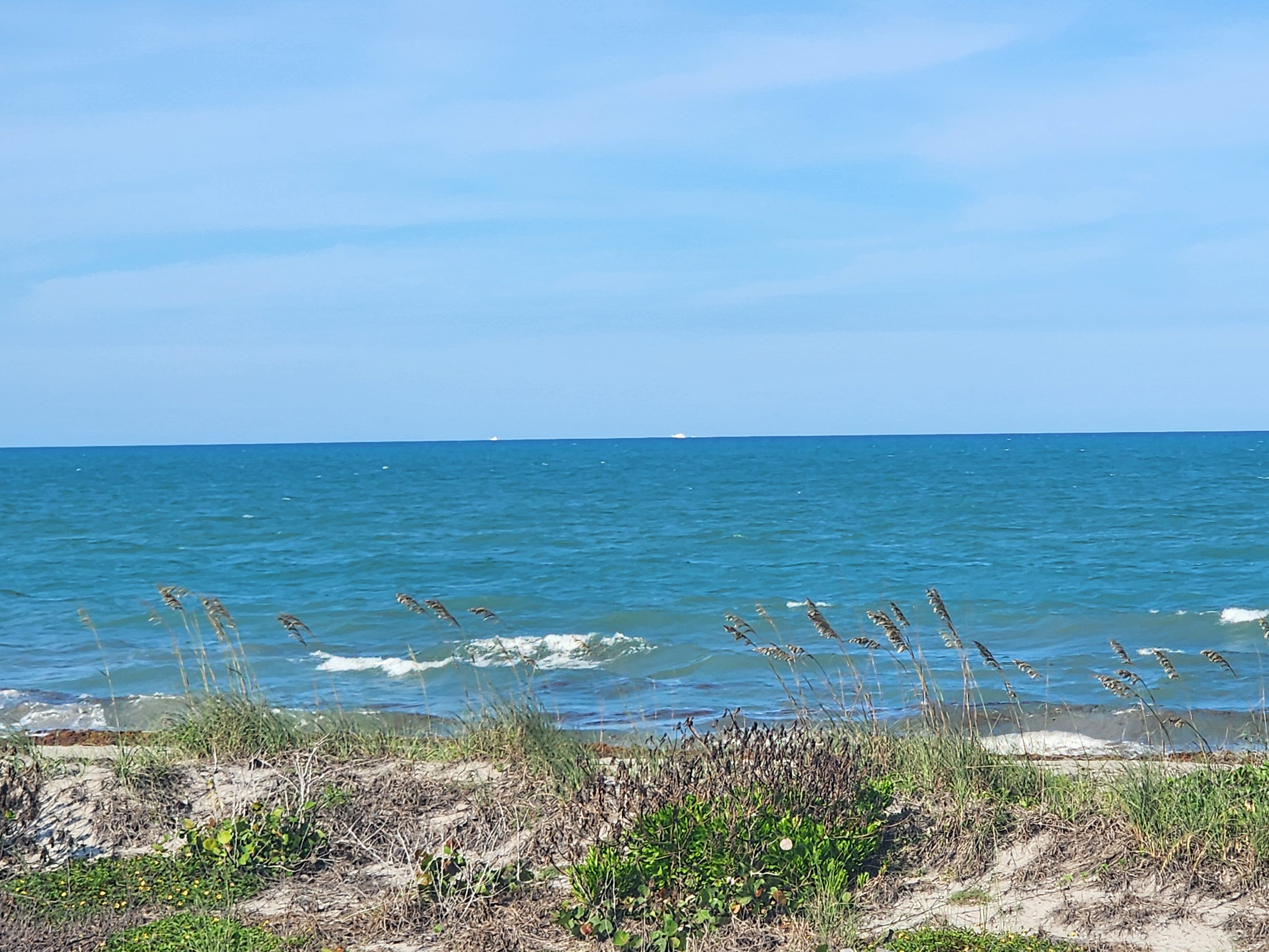 Cocoa Beach surf photo 2 — 5:45 PM hightide — 1-2' ESE bump, longboard or grom wave. Welcome to the doldrums.