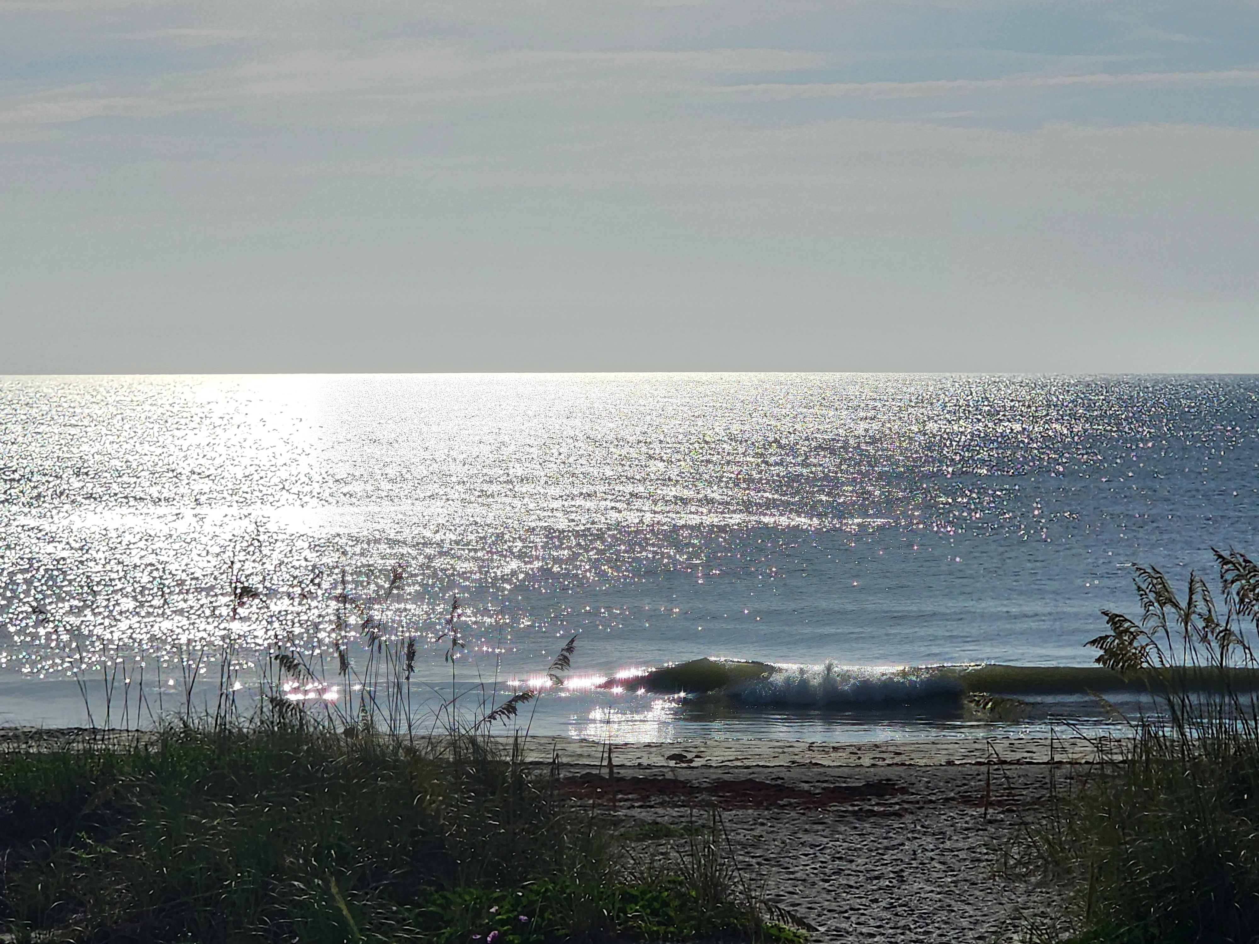 Cocoa Beach surf photo 1 — Flat — 0-1' breaking on shore at mid tide, and already cooking