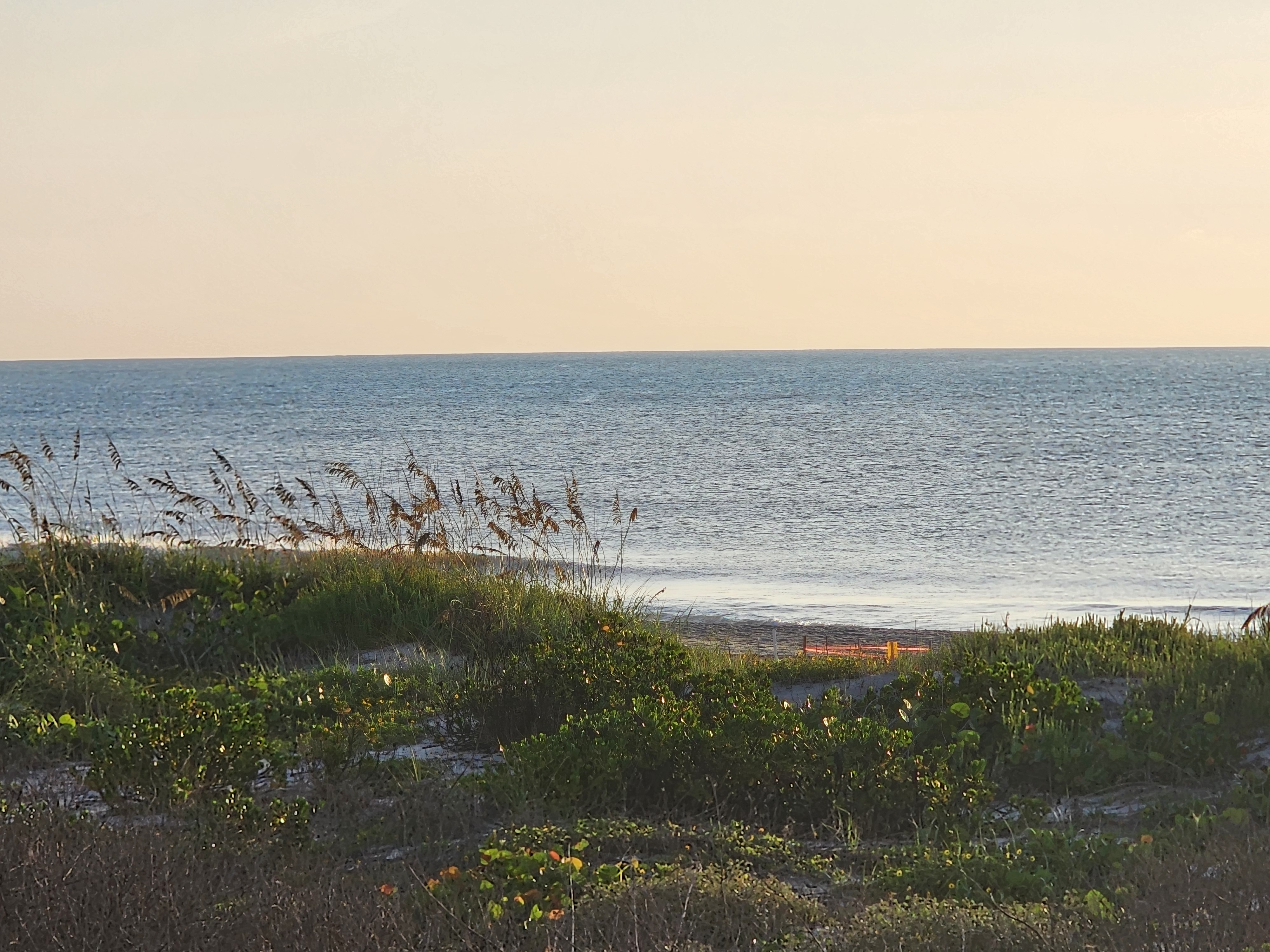 Calm evening light over the shoreline near 32nd Street, Cocoa Beach
